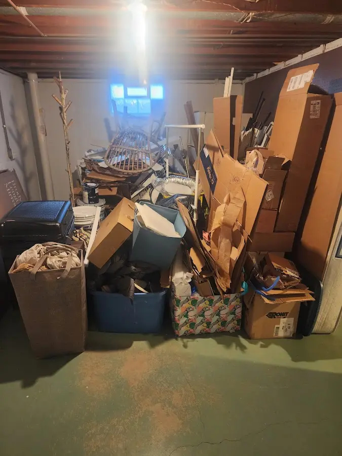 Roll-off dumpster container at job site for Roll Off Dumpster Rental in Hull